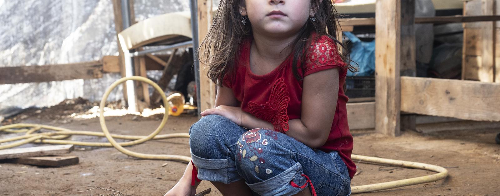 Girl in a refugee camp in Greece